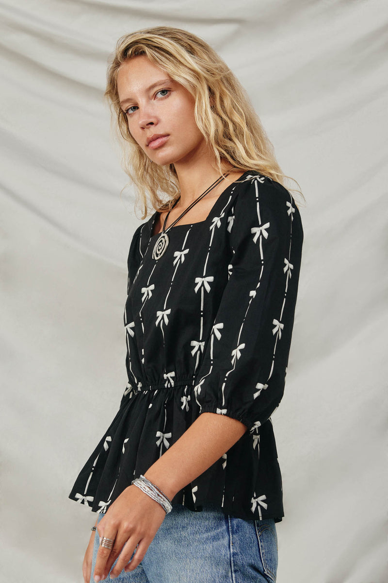 HY8871 Black Womens All Over Bow Print Peplum Top Side