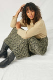 HY2077 Olive Womens Leopard Print Pleated Midi Skirt- Sit Down Pose