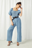 HY2567 Dark Denim Womens Smocked Puff Sleeve Tencel Jumpsuit Pose