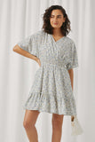 HY5915 Off White Womens Ditsy Floral Smocked Waist Surplice Mini Dress Pose