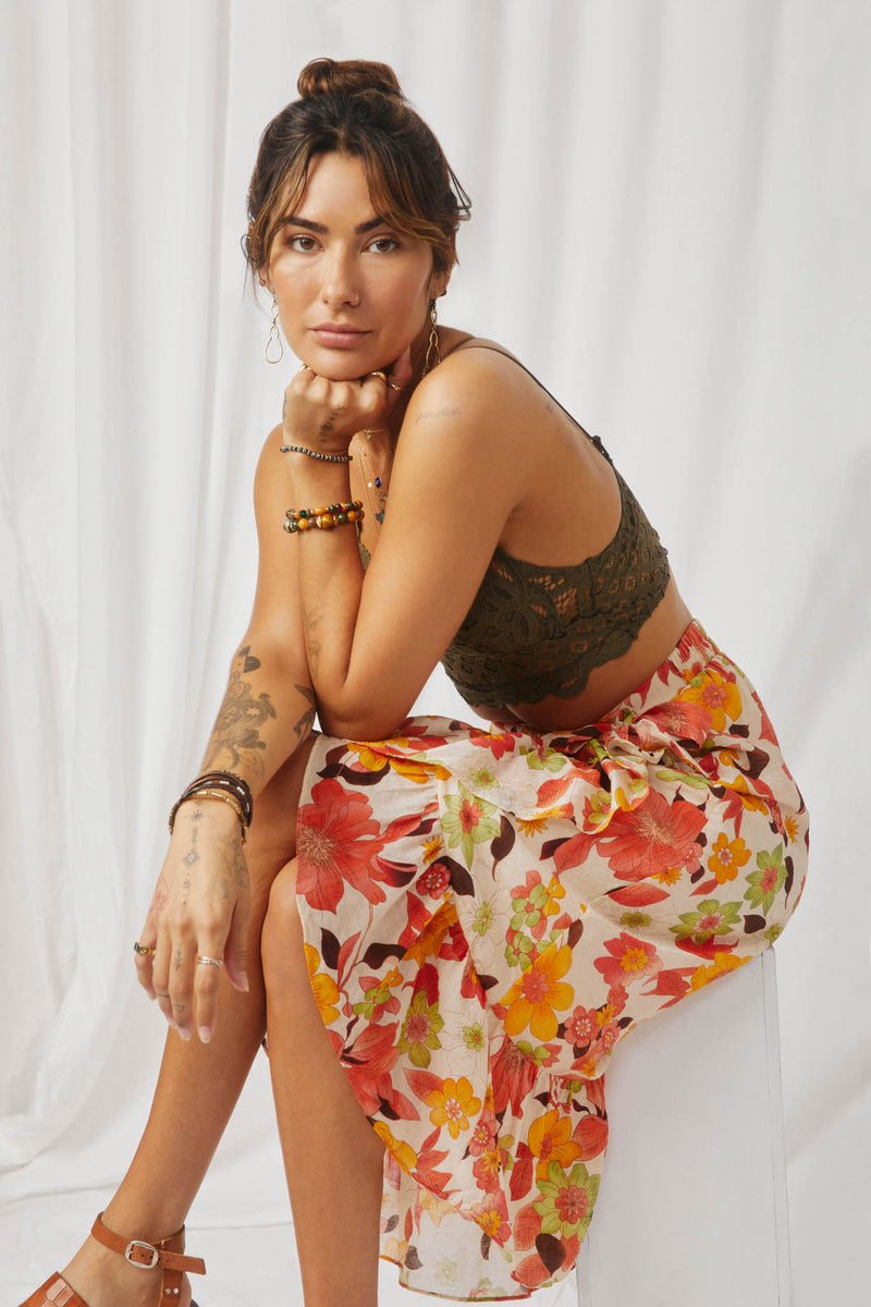 HY6818 Orange Womens Textured Bold Floral Asymmetric Ruffle Tie Skirt Pose