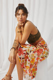 HY6818 Orange Womens Textured Bold Floral Asymmetric Ruffle Tie Skirt Pose