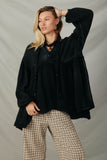 HY7769 Black Womens Washed Raw Edge Puff Sleeve Peplum Top Pose