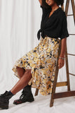 HK1496 Mustard Womens Romantic Floral Asymmetric Ruffle Belted Skirt Pose